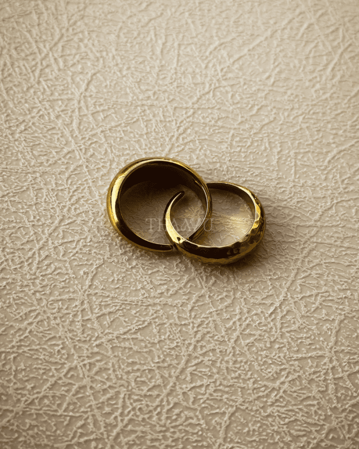 Close-up view of the Hammered Aura Ring, showcasing its unique texture